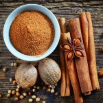 various spices on wooden table