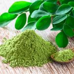 moringa-powder-moringa-oleifera-with-original-fresh-moringa-leaves-rustic-background_100801-545